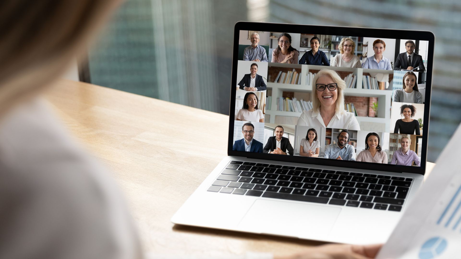 Various people on a laptop screen