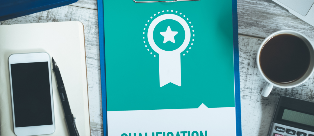 Clipboard showing qualification certificate representing accredited life coach training in the UK